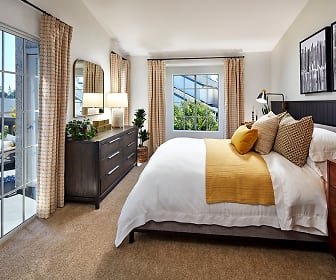 bedroom featuring multiple windows, Seaside At Laguna Heights