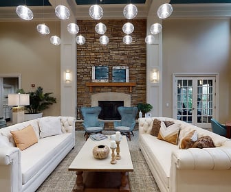 living room with natural light, a high ceiling, and a fireplace, Ridge at Blue Hills