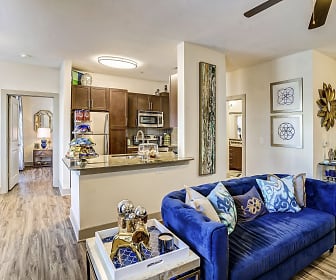 living room with hardwood floors, a ceiling fan, refrigerator, microwave, and range oven, Sundance Creek