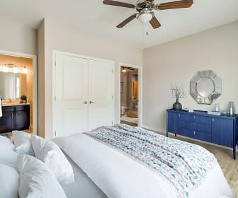 hardwood floored bedroom featuring a ceiling fan, Forestwood Apartments