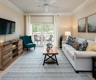 hardwood floored living room featuring natural light, a ceiling fan, and TV, Abberly Pointe