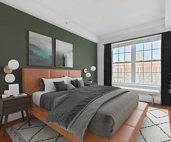 bedroom featuring hardwood flooring and natural light, Juliana Luxury Apartments