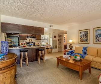 living room with a breakfast bar, carpet, range hood, and range oven, Melrose On The Bay