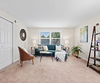 living area with carpet and natural light, Melvin Park