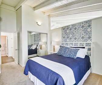 carpeted bedroom with beamed ceiling, Mediterranean Village