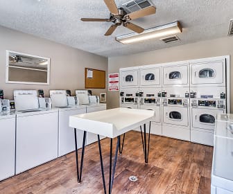 laundry area featuring a ceiling fan, parquet floors, and independent washer and dryer, Arbor Club
