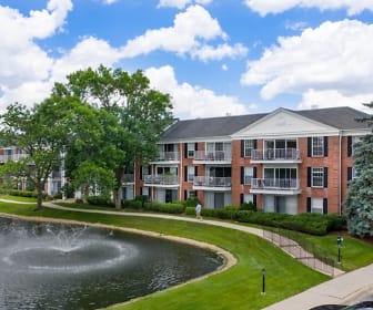surrounding community featuring a water view and a lawn, Versailles On the Lakes/Oakbrook Terrace
