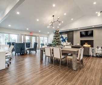 dining space with hardwood floors, a fireplace, and TV, Radius at Ten Mile