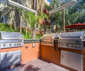 view of terrace with an outdoor kitchen, Glen Oaks Gardens