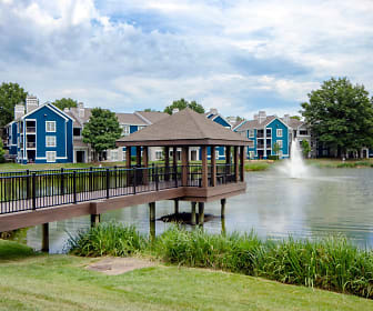 view of dock featuring a water view and a yard, Lakeside