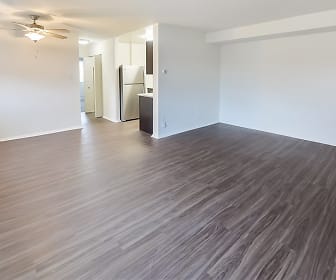empty room with parquet floors, a ceiling fan, baseboard radiator, and refrigerator, Hyde Park Apartment Homes
