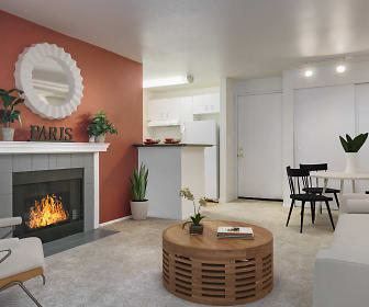 living room featuring carpet, a fireplace, and refrigerator, Seventh and James