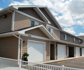 view of property exterior with a deck, Benson Village Townhomes
