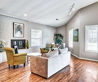 living room with a wealth of natural light, parquet floors, and vaulted ceiling, Spring Creek