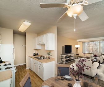 kitchen with a ceiling fan, natural light, electric range oven, TV, dishwasher, microwave, light hardwood floors, light countertops, and white cabinetry, Chesterwood Apartments