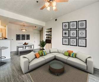 living room featuring a breakfast bar, a ceiling fan, hardwood flooring, and microwave, Huning Castle