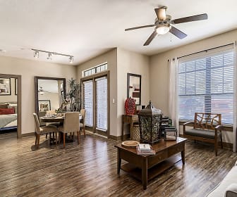 living room with a ceiling fan, plenty of natural light, and hardwood flooring, Sedona Ranch