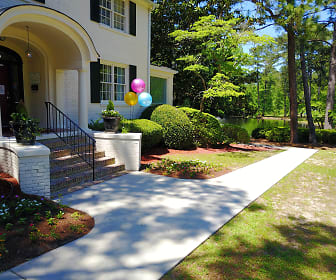 view of front of home with a front lawn, Quail Run Apartments
