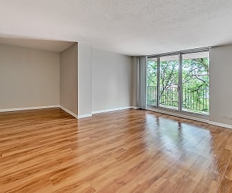 empty room featuring hardwood floors and natural light, 2200 Grace