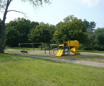 view of playground featuring a large lawn, Shoreview Apartments