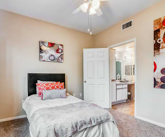 bedroom featuring a ceiling fan and carpet, Farnham Park Apartments