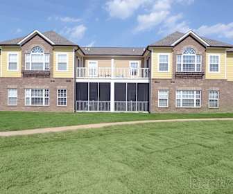 view of front of house featuring an expansive front lawn, The Orleans at Walnut Grove