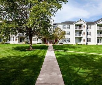 view of home's community featuring an expansive lawn, Fairfax Apartments
