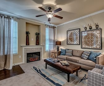 living room with a fireplace, natural light, a ceiling fan, and hardwood flooring, Chateau Mirage