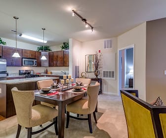 dining space featuring stainless steel refrigerator, range oven, and microwave, The Reserve at Riverdale