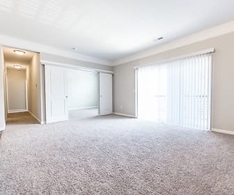 carpeted empty room featuring natural light, The Pointe