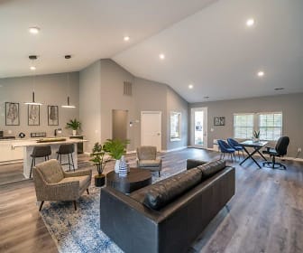 living room featuring hardwood flooring, vaulted ceiling, and natural light, Clemmons Station