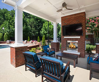 view of patio featuring a ceiling fan, an outdoor living space with a fireplace, and a swimming pool, Bexley Commons At Rosedale