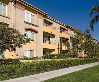 view of property featuring a yard, Westside