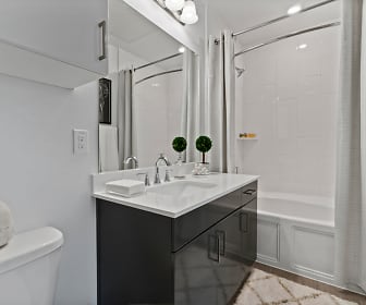 full bathroom with tile floors, shower / bathtub combination, mirror, vanity, toilet, and shower curtain, The Luxe at Mercer Crossing