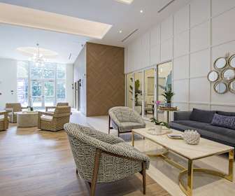 community lobby featuring hardwood flooring and natural light, Blue Lagoon 7
