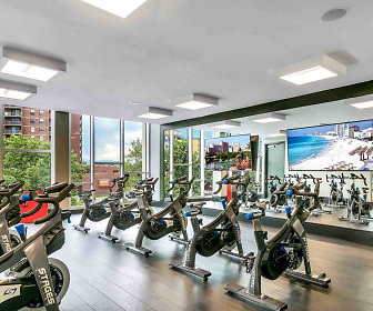 workout area with parquet floors, natural light, and TV, TriVista on Speer