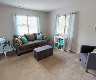carpeted living room with natural light, Indian Woods Apartments of Evansville