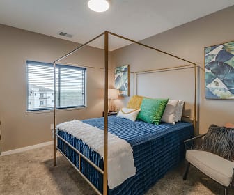 carpeted bedroom with natural light, The Flats at Shadow Creek