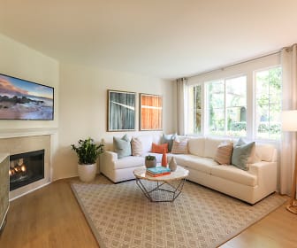 living room with hardwood flooring, natural light, a fireplace, and TV, Newport Bluffs