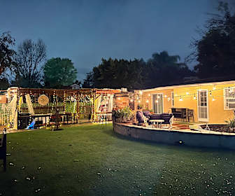 Widebackyardnight.jpg, 23102 Leonora Drive