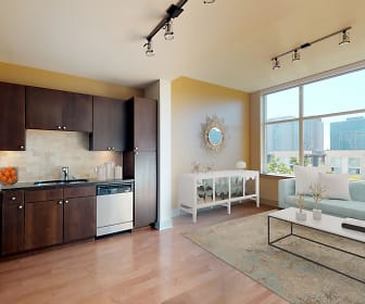 living room featuring a healthy amount of sunlight, hardwood flooring, stainless steel refrigerator, and dishwasher, Ashton Bellevue