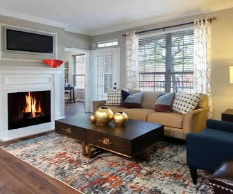 hardwood floored living room featuring a fireplace, natural light, and TV, Lenox Village