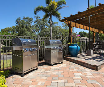 view of patio featuring an outdoor kitchen and a pergola, Agora at Port Richey