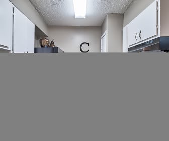 kitchen featuring dishwasher, refrigerator, electric range oven, range hood, stone countertops, white cabinets, and light tile flooring, Maison De Ville