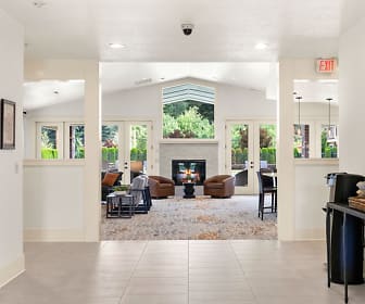 entryway featuring natural light, french doors, tile flooring, and a fireplace, North Glen Villas