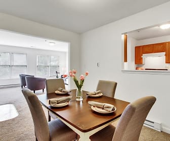 dining room featuring natural light, range hood, baseboard radiator, and refrigerator, Parkview Place