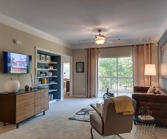 carpeted living room featuring a ceiling fan, natural light, and TV, Legacy at Meridian