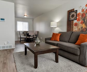 living room featuring hardwood floors, vaulted ceiling, and natural light, Havenwood Townhomes