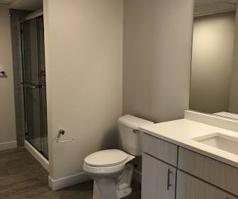 bathroom featuring lofted ceiling, The Terminal Building