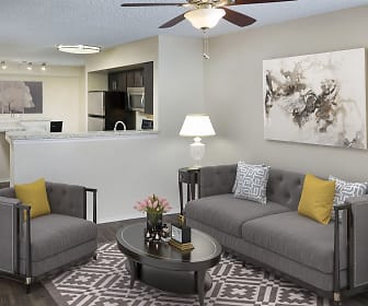 living room featuring a kitchen bar, a ceiling fan, refrigerator, and microwave, Camden Doral Villas